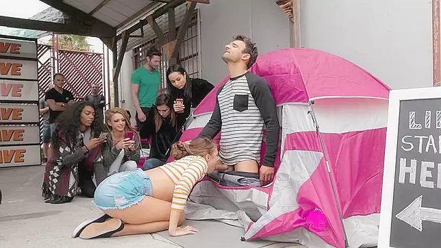 Horny slut gags on XXX boner while waiting in queue for Black Friday