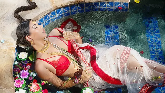 Wrapped in a brilliant red sari Jasmine Sherni rubs her pretty pussy until she orgasms!