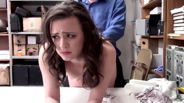 Kinky brunette fucked by horny officer in the storage room