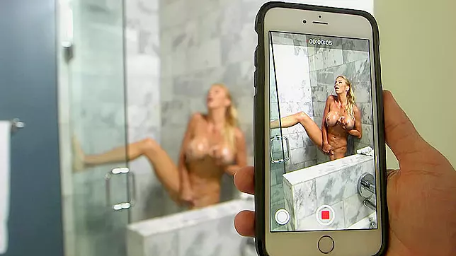 Busty blonde Alexis Fawx plays with her pussy during shower