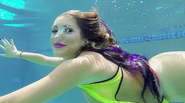 Gorgeous hot XXX girl jumps in the pool and takes her swimsuit off