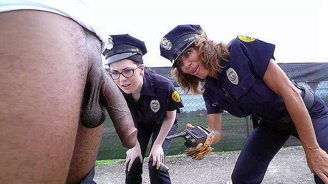 Two sexy cops are eager to give the black rod a free oral sex action