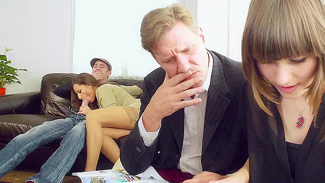 Sensual Jane sucking a dick while her husband sitting just a few inches away