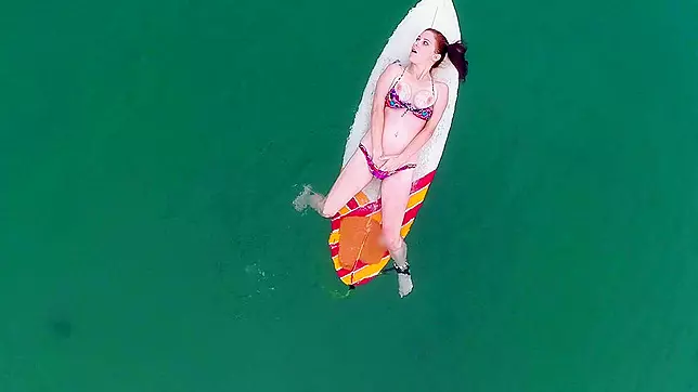 Sexy natural babe Penny Pax chilling on the surfboard